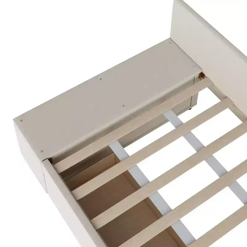 Lit plateforme Whisen une place en L avec rangement enveloppant et tiroirs, construction robuste et durable.