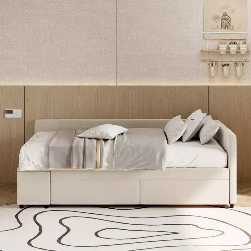Lit plateforme Whisen une place en L avec rangement enveloppant et tiroirs, construction robuste et durable.