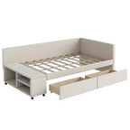 Lit plateforme Whisen une place en L avec rangement enveloppant et tiroirs, construction robuste et durable.