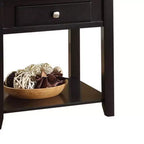 Table d'appoint Malachi 22" noire - Acme Furniture : Dessus relevable, rangement, pieds fuselés, étagère