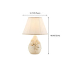 Lampe de table sculptée en céramique blanche avec abat-jour en tissu